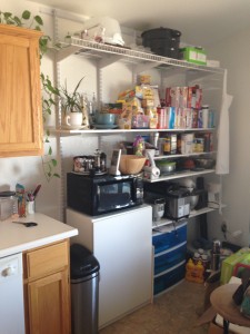 This shelf is in the kitchen, sort of an extension of the cabinets along the west wall.